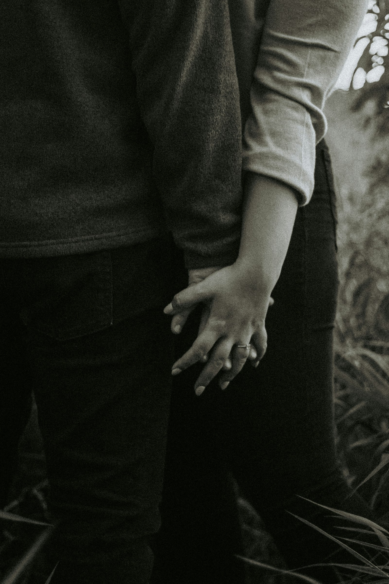 Couple holding hands